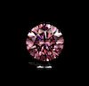 A 0.58 Carat Round Brilliant Cut Fancy Intense Purplish Pink Diamond,
