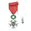 MEDAL OF THE LEGION OF HONOR. FRANCE, FIRST HALF OF THE 20TH CENTURY. In metal with green, blue and white enamel. Red ribbon. 