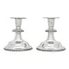 A PAIR OF CANDLESTICKS. MEXICO, 20TH CENTURY. Sterling 0.925 Silver. Smooth design. Decorated with shredded motifs. 