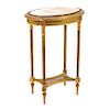 SIDE TABLE. FRANCE, CIRCA 1900. Louis XVI Style. Golden wood with oval marble cover.