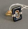 14K gold onyx and diamond ring designed with rectangular onyx with small diamonds flanking, size 5 1/4 in., total weight: 10.8 g.