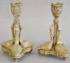 Pair of continental neoclassical figural candlesticks having supports in the form of three swans on turned feet. ht. 6 1/2 in., wd. ...