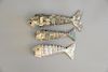 Three mother of pearl fish with articulating bodies. lg. 6 3/4" x 7 3/4" x 6"