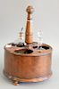Regency mahogany bottle carrier with circular body cut out for three bottles. ht. 15 in., dia. 10 1/2 in.