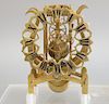 Brass skeleton clock, 19th century, pierced chapter ring with black enameled Roman numerals in plexiglass box, face loose. clock ht....