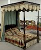 Continental mahogany double canopy bed, having reeded baluster post, now with double adjustable box spring. ht. 94" , wd. 54".
