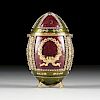 A VIVIAN ALEXANDER RHINESTONE INLAID AND ENAMELED GILT METAL EGG PURSE, LABELED AND NUMBERED,