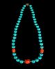 A Chinese Turquoise and Coral Beaded Necklace
Length 12 in., 30 cm.