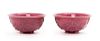 A Pair of Chinese Mauve Peking Glass Bowls
Each: diam 6 3/4 in., 17 cm. 