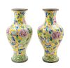 A Pair of Chinese Canton Enamel on Copper Vases
Height 18 1/2 in., 47 cm. 