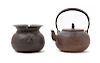 Two Japanese Cast Iron Tea Wares
Height of teapot 7 3/4 x width 6 in., 20 x 15 cm. 