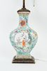 A Famille Rose Turquoise Ground Vase as a Lamp.