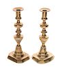 Pair of Early Brass Push Up Candlesticks