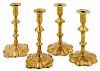 Two pairs of English Queen Anne brass candlestick