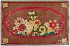 Dog and floral hooked rug, early 20th c.