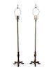 A Pair of Italian Gilt Metal Candlesticks
EARLY 20TH CENTURY
on tripod base, now mounted as lamps.
Height 35 1/2 inches.
