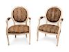 A Pair of Louis XVI Style Carved and White Washed Fauteuils
Height 35 1/2 inches.