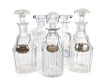 A Group of Five Glass Decanters
Height of tallest 10 1/2 inches.