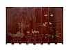A Chinese Eight-Panel Lacquer Screen
19TH CENTURY
Height 83 x width of each panel 16 inches.