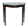 A Hollywood Regency Style Black and Gilt Painted Console Table
Height 31 1/2 X width 33 1/4 X depth 14 inches.