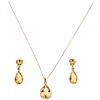 A citrin 18K yellow gold choker, pendant and pair of earrings set.