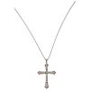An emerald and diamond palladium silver necklace and cross. 