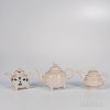 Three Staffordshire Salt-glazed Stoneware Teapots and Covers
