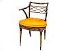 A Regency Style Ebonized Poycrhome and Gilt Decorated Open Arm Chair
Height 32 inches.