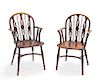 A pair of George III yewwood Windsor armchairs