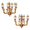 A pair of Louis XVI style gilt bronze chandeliers