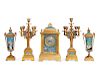A French bronze and enamel clock garniture