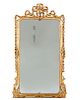 A Louis XVI style carved giltwood mirror