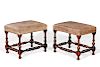 Pair of Continental Baroque carved walnut stools