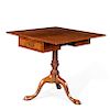 A George II plum pudding mahogany tilt top table