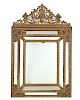 A Louis XIV style  brass and ebonized mirror