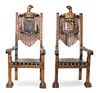 A Pair of Carved Wood and Leather Throne Chairs Height 63 x width 27 3/4 x depth 24 1/2 inches.