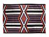 A Navajo Weaving in Fourth Phase Design 58 x 83 1/2 inches.