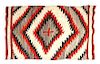 A Navajo Transitional Eye Dazzler Rug First: 82 x 55 inches.