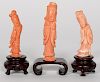 Three Chinese Carved Pink Coral Figures on Stands
