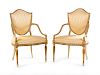 A Pair of George III Cream-Painted and Parcel Gilt Shield-Back Armchairs 