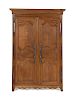 A French Provincial Carved Oak Armoire