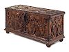 A Continental Carved Walnut Cassone
