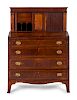 A Federal Inlaid and Figured Mahogany Lady's Tambour Writing Desk