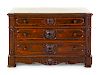 A Rococo Revival Rosewood Chest of Drawers
