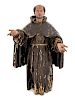 A Continental Painted Figure of Saint Francis