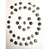 1 CARD OF SMALL WHITE METAL PICTURE BUTTONS