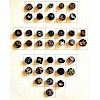 1 CARD OF SMALL DIVISION 1 BLACK GLASS PICTORIAL BUTTONS