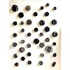 1 CARD OF BLACK GLASS PICTORIAL BUCKLE BUTTONS