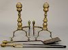 Four piece lot to include, pair of Federal brass andirons with log stops and two matching brass top tools. height 20 1/2 inches, depth 26 inches.
