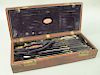 Civil War G. Tiemann surgical instruments, surgeons or amputation set in brass bound fitted box having trephine with detachable handle and amputation 